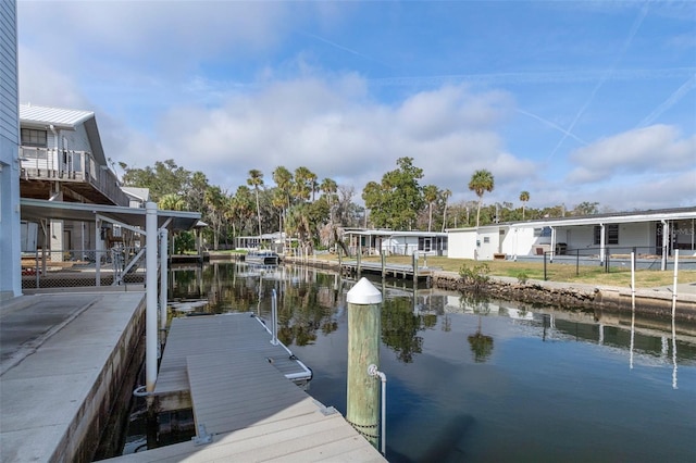 view of dock with a water view