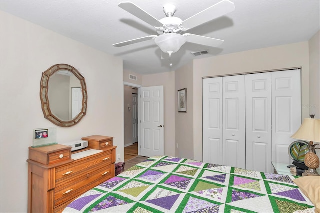 bedroom with a closet and ceiling fan