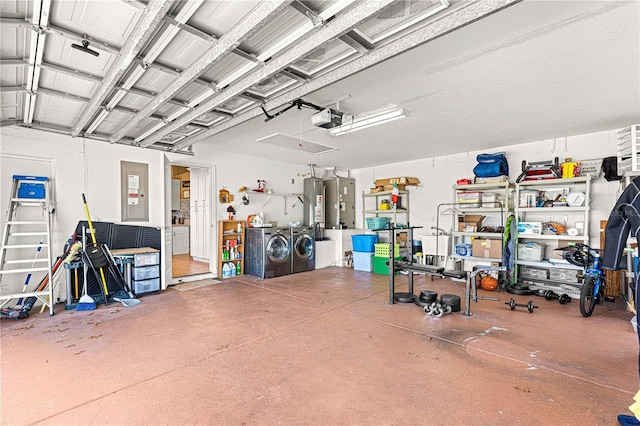 garage featuring separate washer and dryer, a garage door opener, and gas water heater