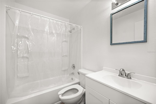 full bathroom with toilet, vanity, and shower / bath combo with shower curtain