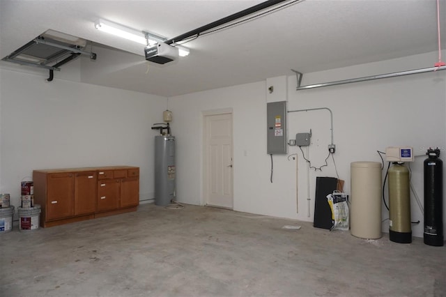 garage featuring a garage door opener, electric water heater, and electric panel