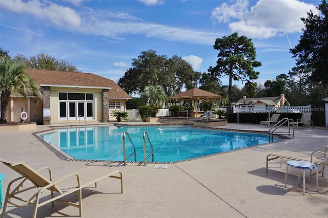 view of pool featuring a gazebo and a patio area