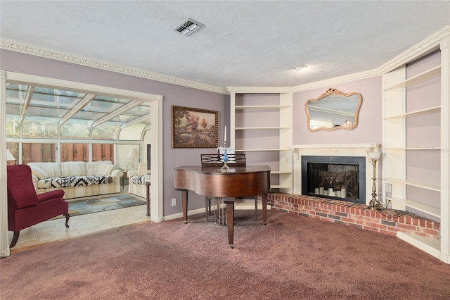 living area featuring carpet and a textured ceiling