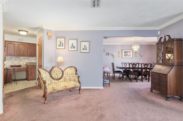 living area with ornamental molding, light carpet, and a notable chandelier