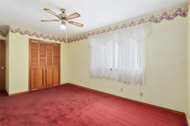 unfurnished bedroom featuring ceiling fan, a closet, and carpet