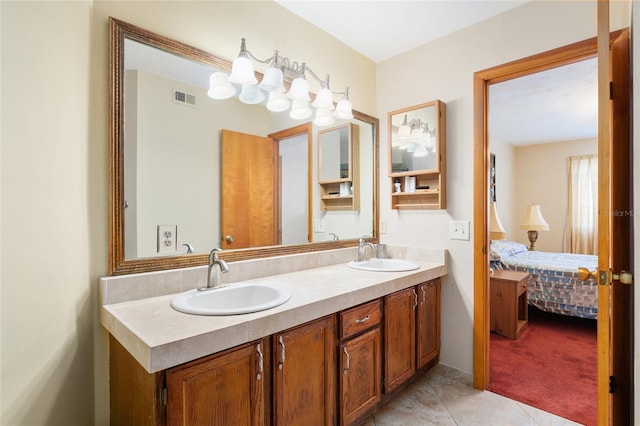 bathroom with vanity and tile patterned floors