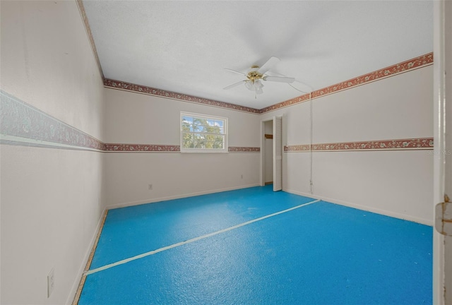 interior space featuring ceiling fan