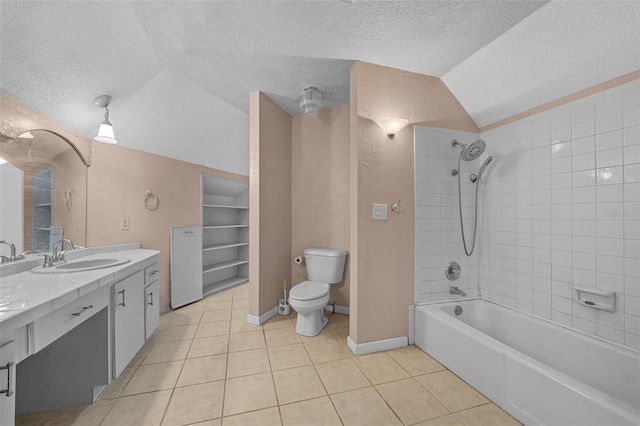 full bathroom with lofted ceiling, tiled shower / bath combo, vanity, a textured ceiling, and tile patterned floors