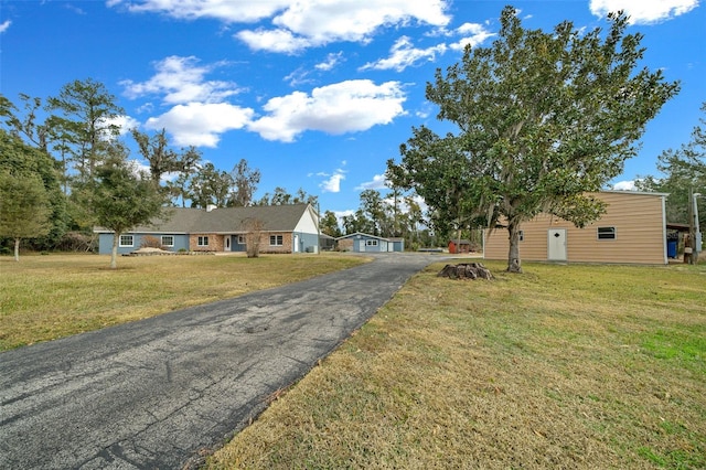 view of front of home with a front yard