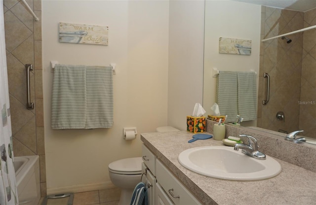 full bathroom featuring tile patterned floors, vanity, toilet, and tiled shower / bath combo