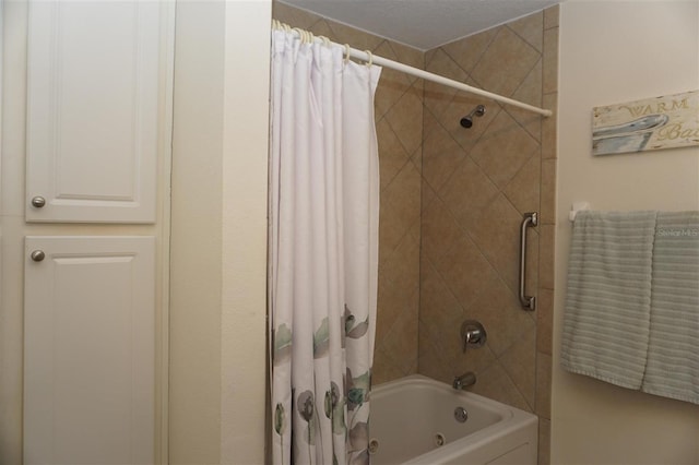 bathroom with shower / bath combo