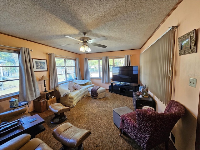 carpeted living room featuring crown molding, a wealth of natural light, a textured ceiling, and ceiling fan