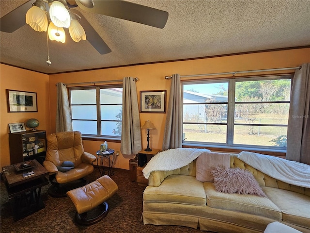 living room featuring ornamental molding, a healthy amount of sunlight, and carpet flooring