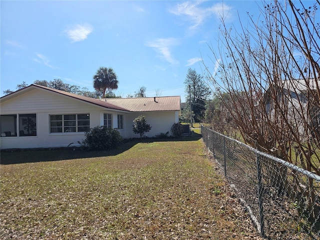 exterior space with a yard