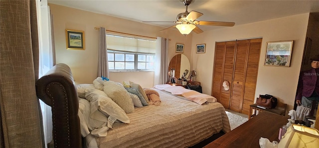 bedroom with ceiling fan and a closet