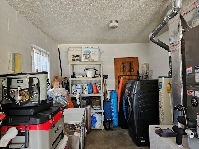 garage with washer / dryer and water heater