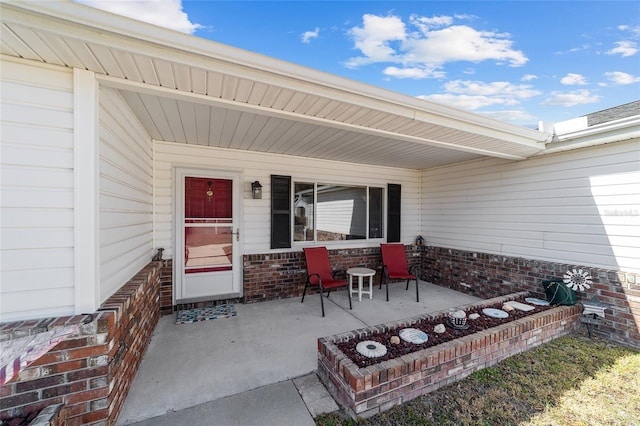 view of patio featuring a porch