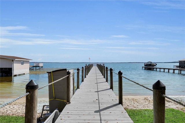 dock area featuring a water view