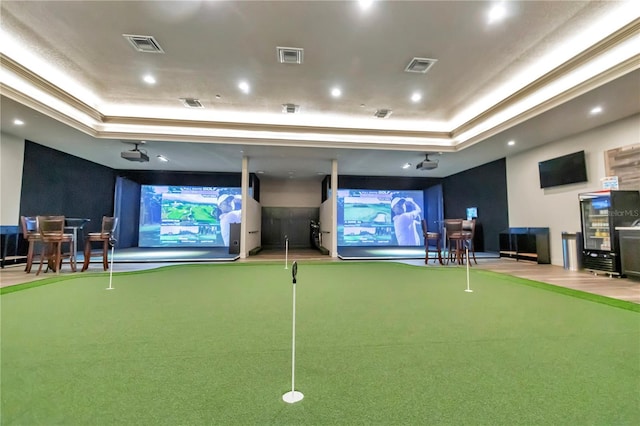 rec room featuring a raised ceiling, golf simulator, and carpet flooring