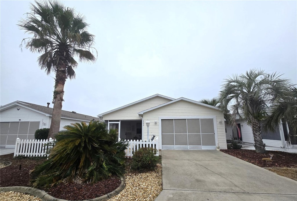 single story home with a garage