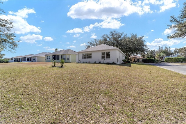 view of front facade with a front lawn