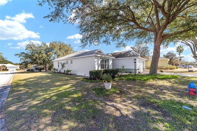 view of property exterior with a lawn