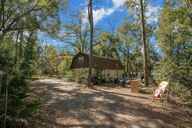 exterior space featuring an outbuilding