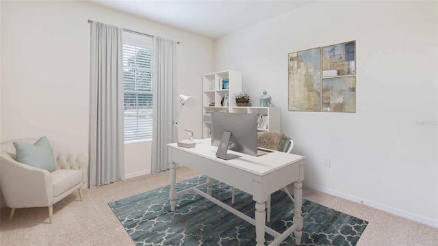 office area with carpet, baseboards, and a wealth of natural light