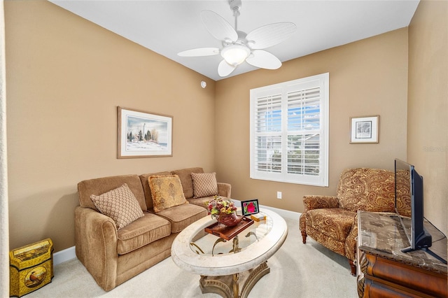 living room with carpet flooring and ceiling fan