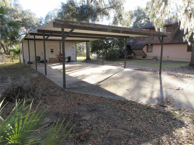 view of vehicle parking featuring a carport