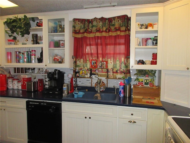 kitchen with stove, white cabinets, sink, and dishwasher