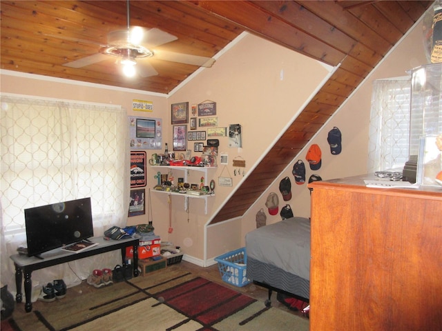 bedroom with lofted ceiling, ornamental molding, and wooden ceiling