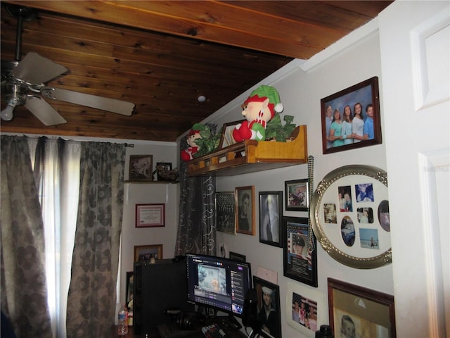 interior space featuring wooden ceiling and ceiling fan