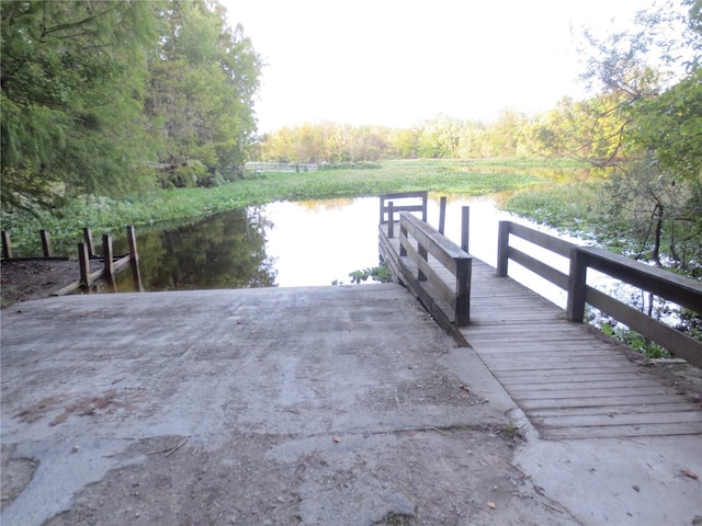 dock area featuring a water view