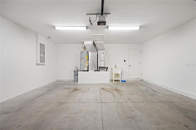 garage with electric panel, a sink, heating unit, electric water heater, and a garage door opener