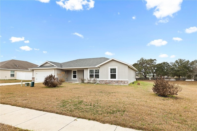 ranch-style house featuring a front lawn, fence, stucco siding, stone siding, and an attached garage