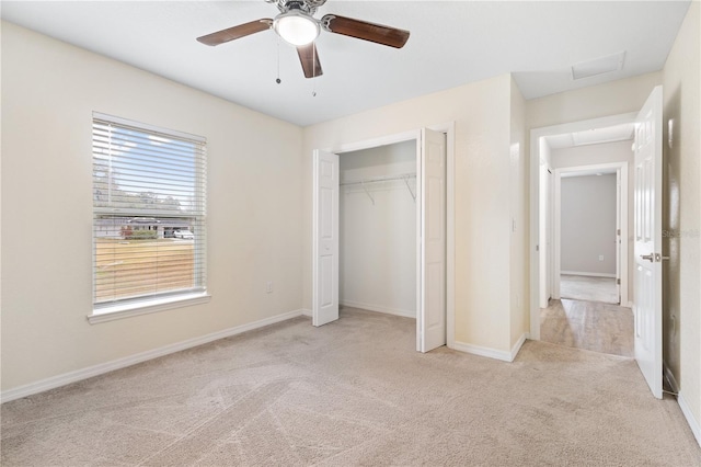 unfurnished bedroom with a closet, ceiling fan, baseboards, and carpet