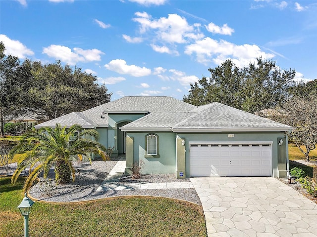 view of front of home with a garage