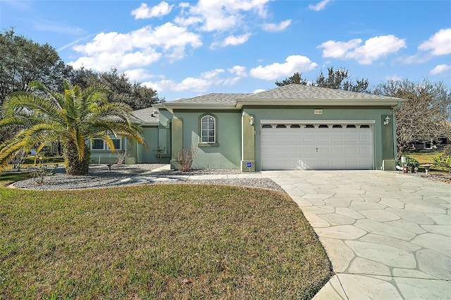 view of front of home with a garage and a front yard