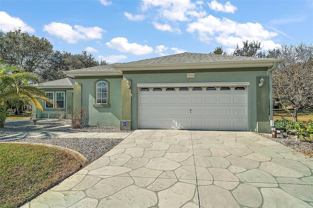 ranch-style house featuring a garage