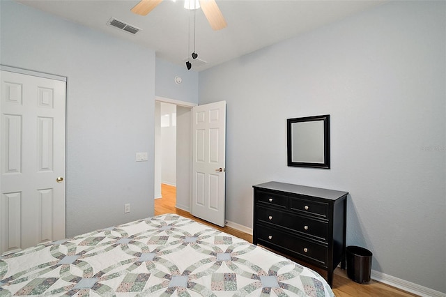 bedroom featuring ceiling fan and light hardwood / wood-style flooring