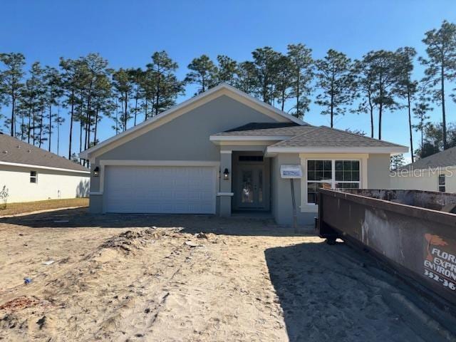 view of front of home featuring a garage