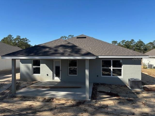 back of house featuring a patio and central AC