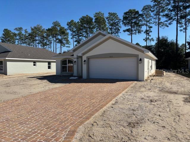 ranch-style house with a garage