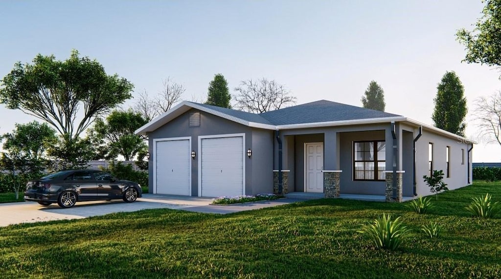 view of front of home with a garage and a front lawn