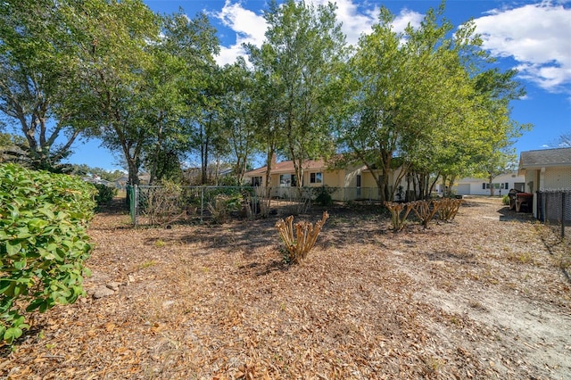 view of yard with fence