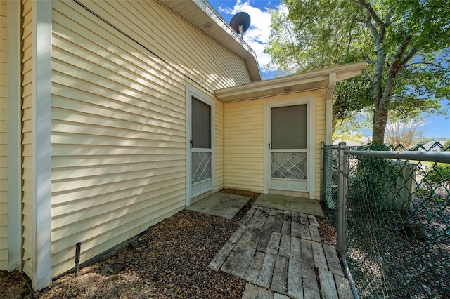 property entrance featuring fence