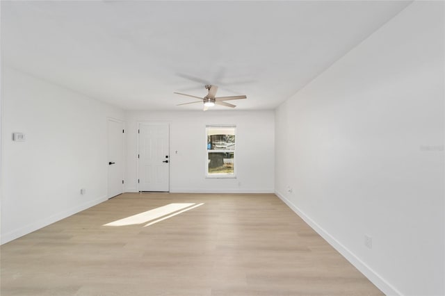 unfurnished room featuring ceiling fan and light hardwood / wood-style flooring