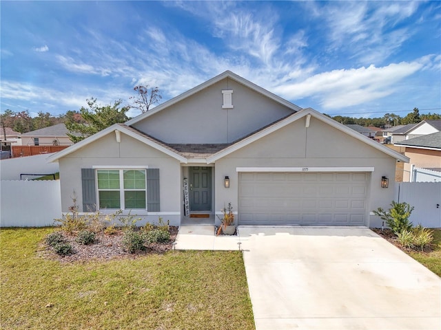 ranch-style house featuring a garage and a front yard