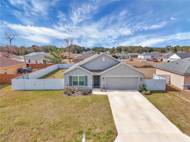 ranch-style home featuring a garage and a front yard